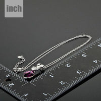 Pendant detail on KHAISTA large purple crystal pendant necklace