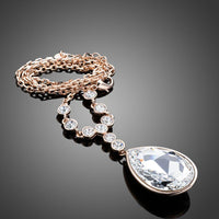 Close up detail of KHAISTA large waterdrop crystal pendant necklace