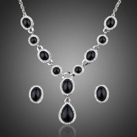Khaista black crystal necklace and earrings set on white background