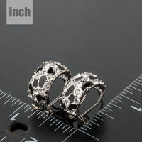 black leopard design clip earrings detail view by KHAISTA