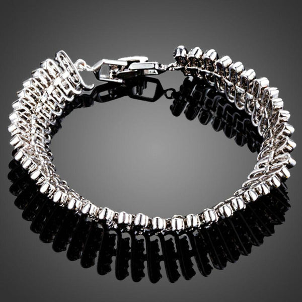 KHAISTA black CZ link chain bangle on white background