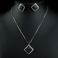Side angle view of Khaista owl crystal set