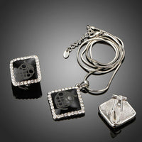 Close-up of owl print on Khaista black crystal set