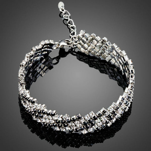 KHAISTA black zig zag CZ bracelet on white background
