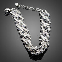 Close up detail of KHAISTA black zig zag CZ bracelet