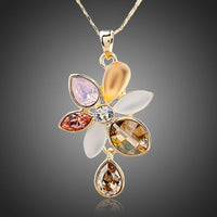 KHAISTA blooming flower crystal necklace on white background