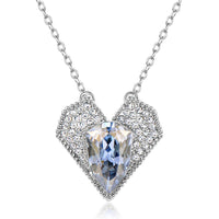 Side angle view of KHAISTA blue Austrian crystal vintage heart necklace