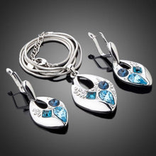 Load image into Gallery viewer, Blue Crystal Clip Earrings and Necklace Set - KHAISTA Fashion Jewellery
