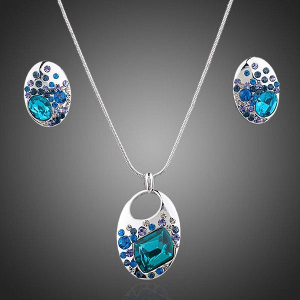 Khaista blue crystal necklace and earrings set on white background