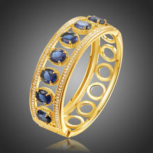 Load image into Gallery viewer, Blue Crystals Golden Design Bangle -KBQ0113 - KHAISTA Fashion Jewelry
