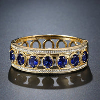 blue crystal gold bangle detail view by KHAISTA