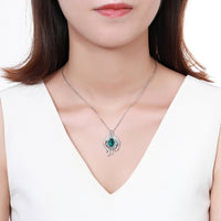Pendant detail on KHAISTA blue crystal pendant chain necklace