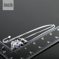 Pendant detail on KHAISTA blue effect crystal cluster necklace
