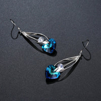 blue heart crystal drop earrings detail view by KHAISTA