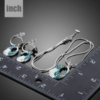 Blue leopard drop earring detail by Khaista
