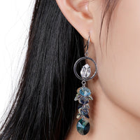blue crystal long drop earrings detail view by KHAISTA