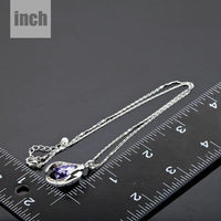 Pendant detail on KHAISTA blue crystal love pendant necklace
