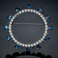 Side angle view of Khaista blue geometric brooch