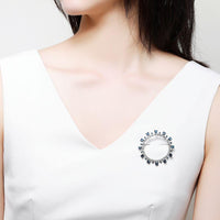Close-up of blue Austrian crystals on Khaista geometric brooch
