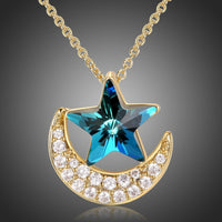 KHAISTA blue star gold moon chain necklace on white background