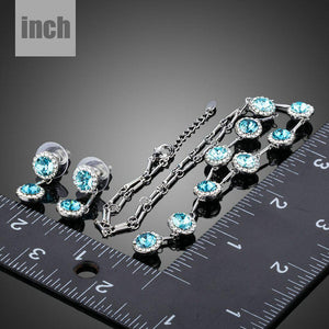 Blue Stellux Austrian Crystal Drop Earrings and Pendant Necklace Set - KHAISTA Fashion Jewellery