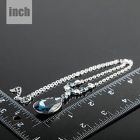 Pendant detail on KHAISTA blue water crystal pendant necklace