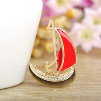 Khaista crystal sailing boat brooch on white background