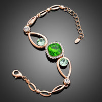 Side angle view of KHAISTA bold green stone designer bracelet