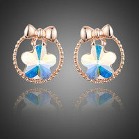 KHAISTA bow knot crystal flower stud earrings on white background