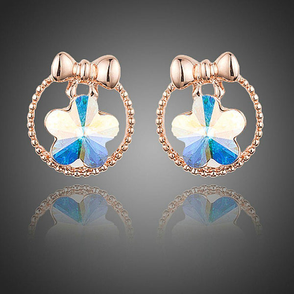 KHAISTA bow knot crystal flower stud earrings on white background