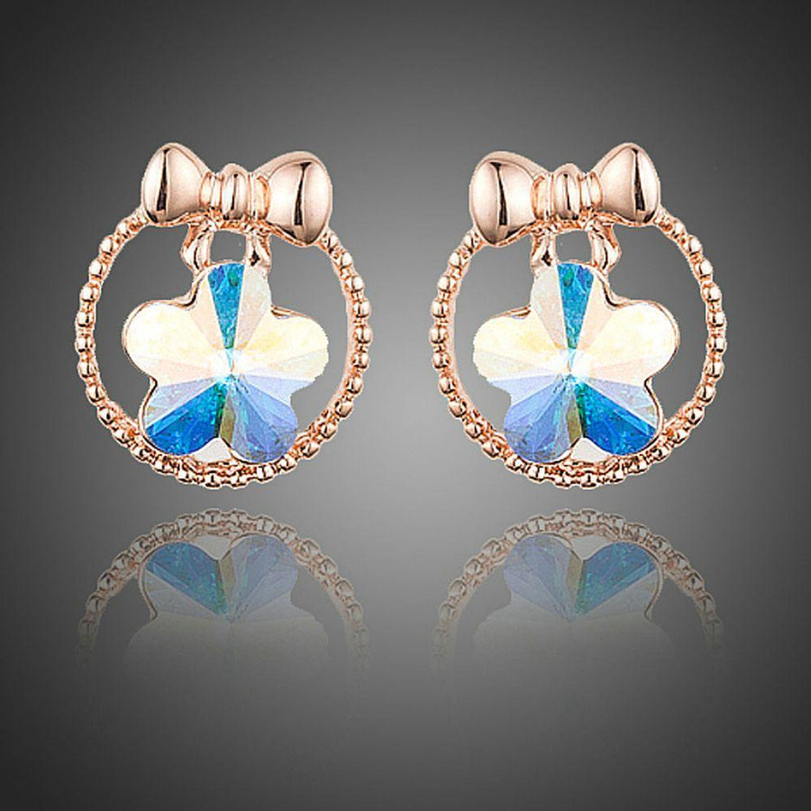 KHAISTA bow knot crystal flower stud earrings on white background
