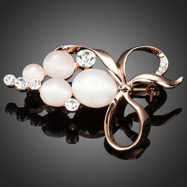 Khaista crystal bow knot brooch pin on white background