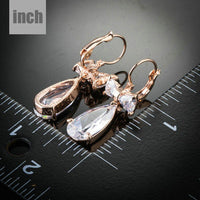 bow knot CZ drop earrings detail view by KHAISTA