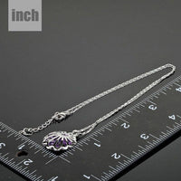 Pendant detail on KHAISTA white gold bud Stellux crystal necklace