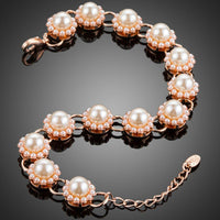 Close up detail of KHAISTA budding flower pearl bracelet