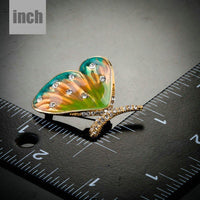 Side angle view of Khaista butterfly crystal brooch