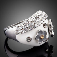 Detailed macro close up view of the brilliant stone settings on this premium butterfly crystal party ring