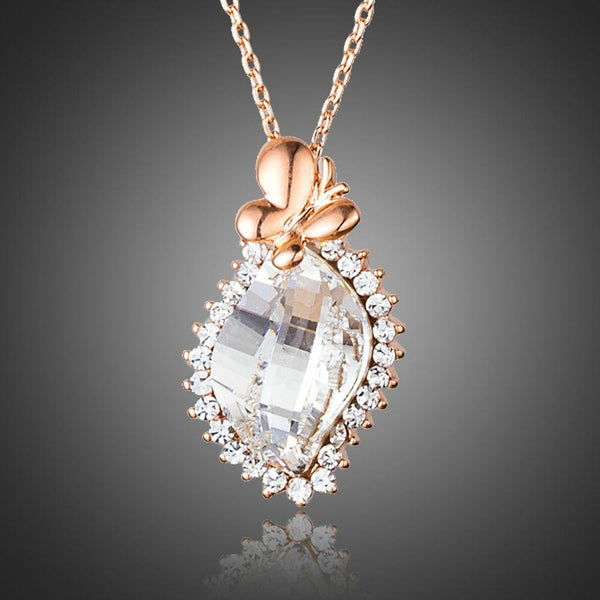 KHAISTA butterfly on crystal pendant necklace on white background