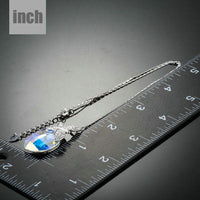 Pendant detail on KHAISTA butterfly on crystal pendant necklace