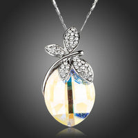 KHAISTA butterfly on crystal pendant necklace on white background