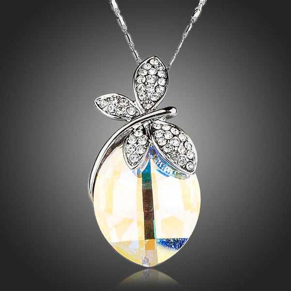 KHAISTA butterfly on crystal pendant necklace on white background