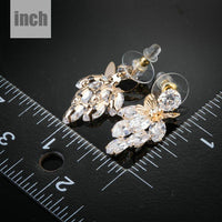 butterfly on leaf crystal drop earrings detail view by KHAISTA