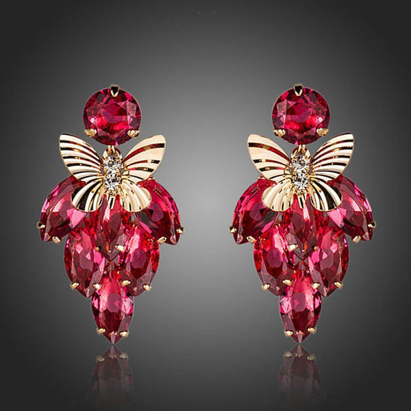KHAISTA crystal butterfly raspberry drop earrings on white background