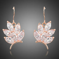 KHAISTA butterfly shaped CZ drop earrings on white background