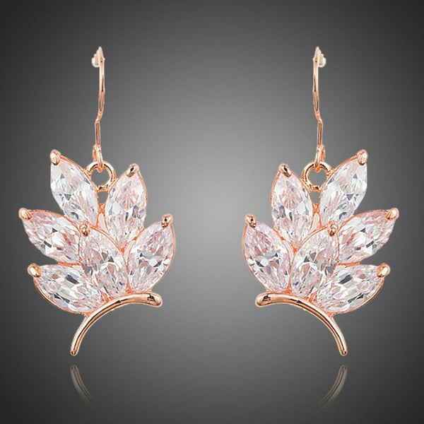 KHAISTA butterfly shaped CZ drop earrings on white background