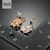 butterfly shaped CZ drop earrings detail view by KHAISTA