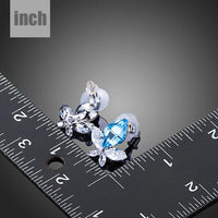 sea blue crystal butterfly stud earrings detail view by KHAISTA