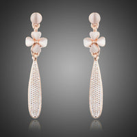 KHAISTA cactus flower crystal drop earrings on white background