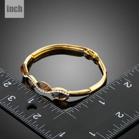 caramel crystal wave bangle detail view by KHAISTA