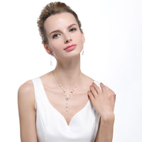 Close-up of cat's eye and CZ stones on Khaista floral set